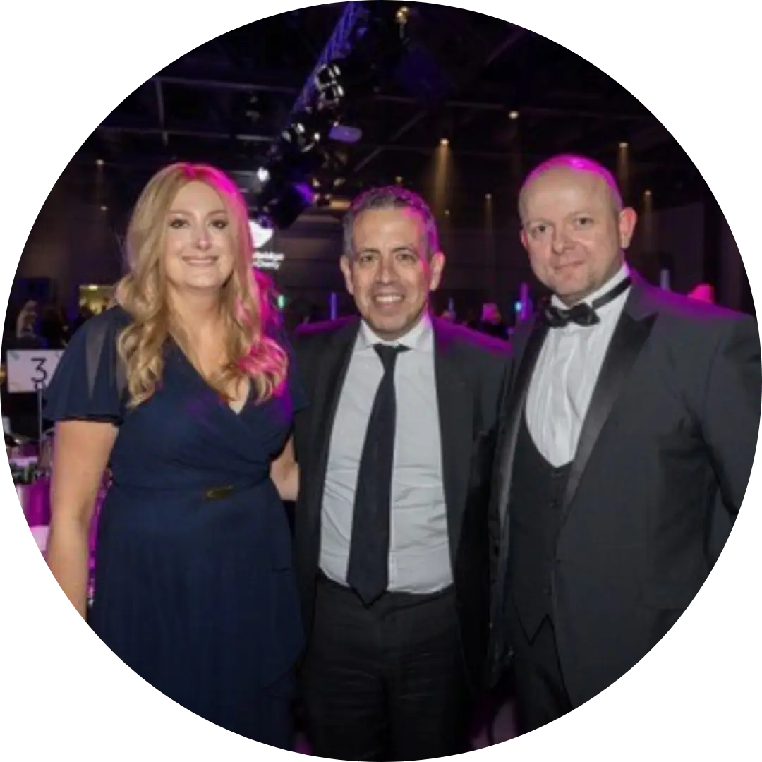 Chloe, Professor Carlo Palmieri and Mike at the Clatterbridge Cancer Charity 2024 Ball