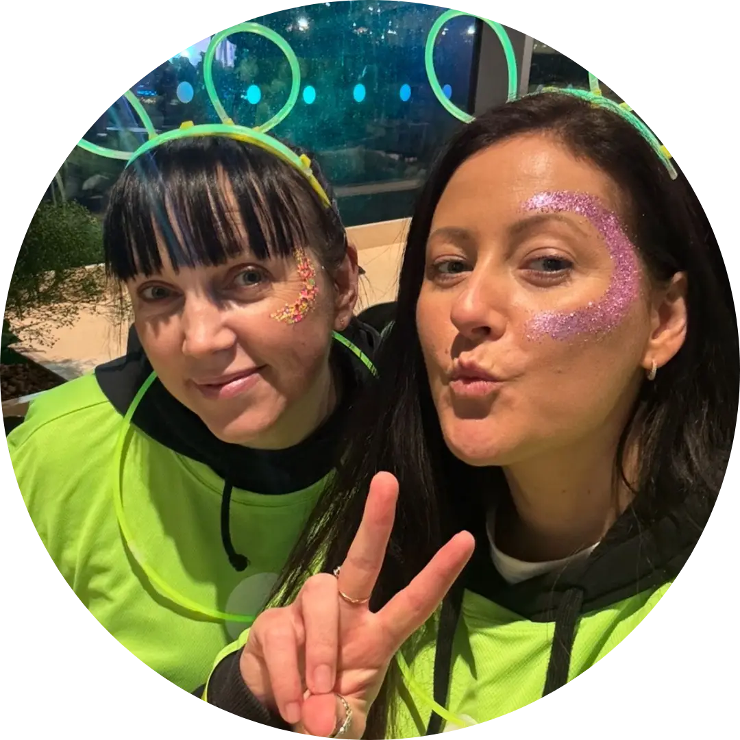 Kerry and her friend taking part in the Glow Green Walk for Clatterbridge Cancer Charity